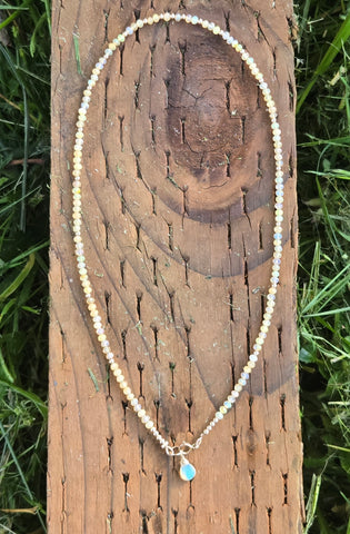 Faceted Welo Opal 14K Gold Infiniti Necklace