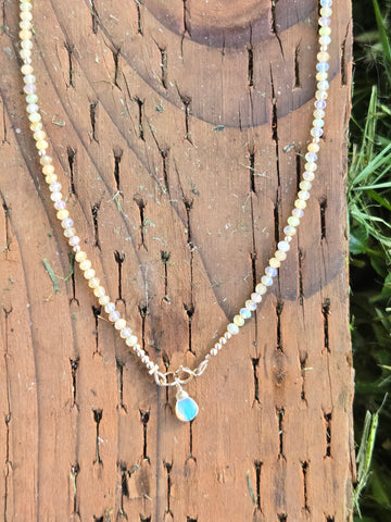 Faceted Welo Opal 14K Gold Infiniti Necklace